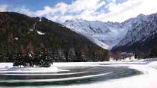 Ice and Snow, frozen lake in Stelvio national park, phtography by jane gifford