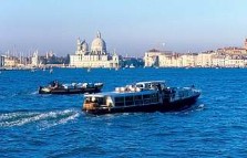 vaporetto crossing veice lagoon with santa maria della salute in the distance, veneto, italian gourmet travel, photographer jane gifford, your  exclusive photographic travel guide to italy 